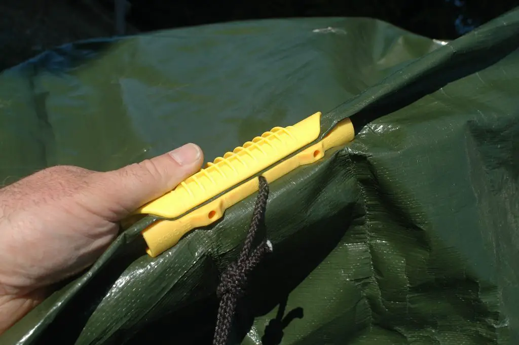 grabbit hand action Tidy Way to Tie Down Tarps