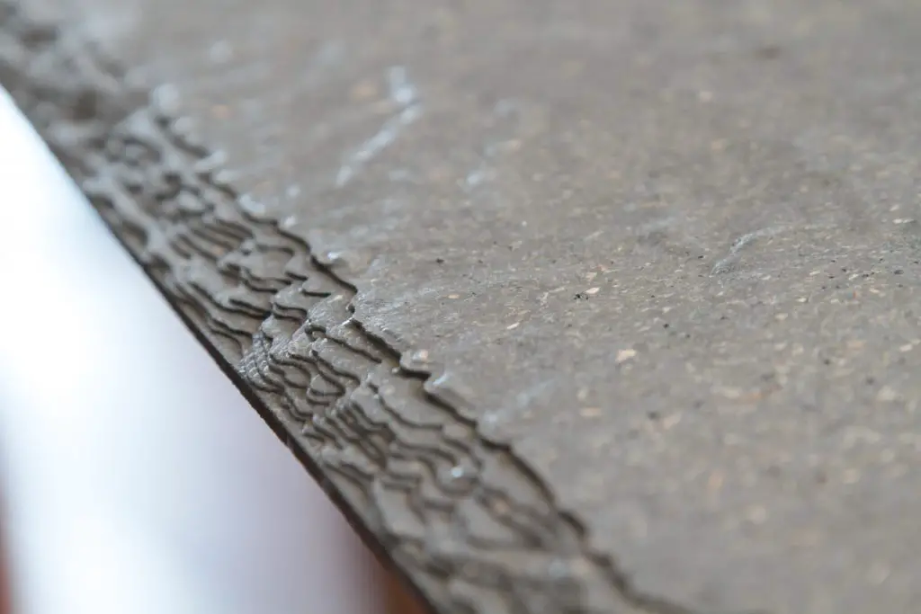 Close-up of textured concrete surface edge.
