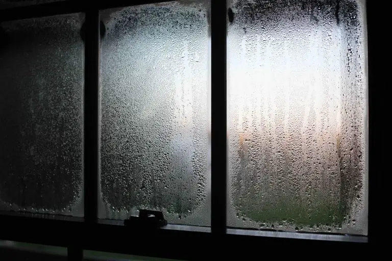 Condensation on windowpane during sunset
