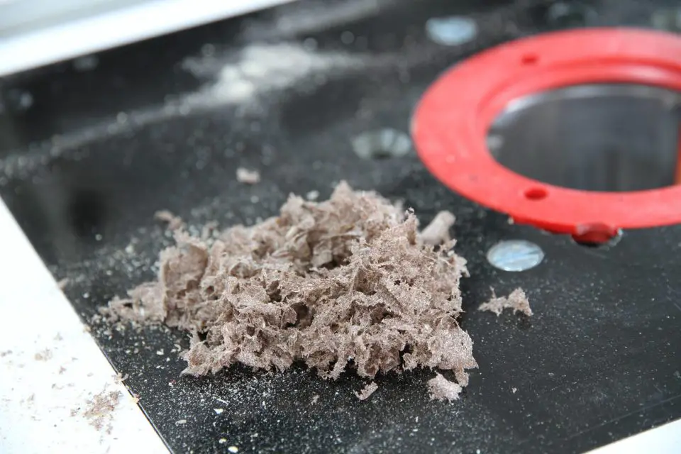 These router shavings come from Trex I used for the frame shown above. This material mills as well as wood, with no melting as you might expect working with plastic.