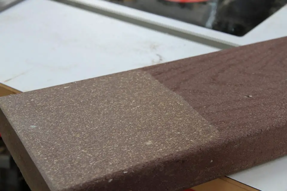 I ran this piece of Trex composite over my jointer to create a flat face, as I would with any piece of rough lumber.
