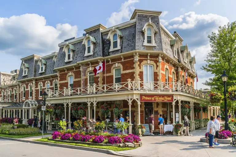 Historic Prince of Wales Hotel with Canadian flag.