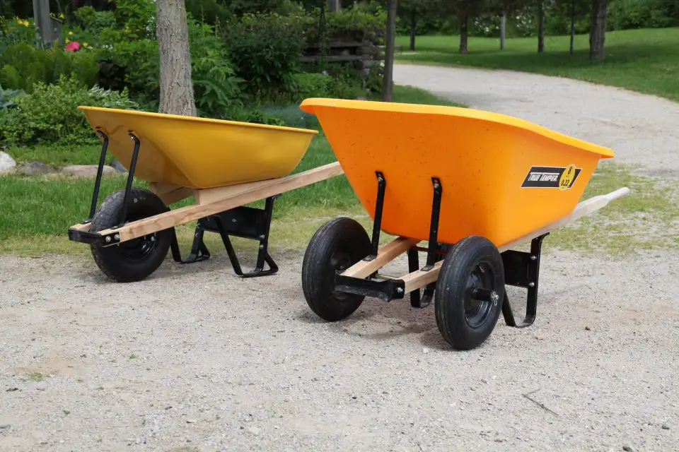 The dual-wheel barrow on the right is more stable than the single wheel model, but it’s also less maneuverable.