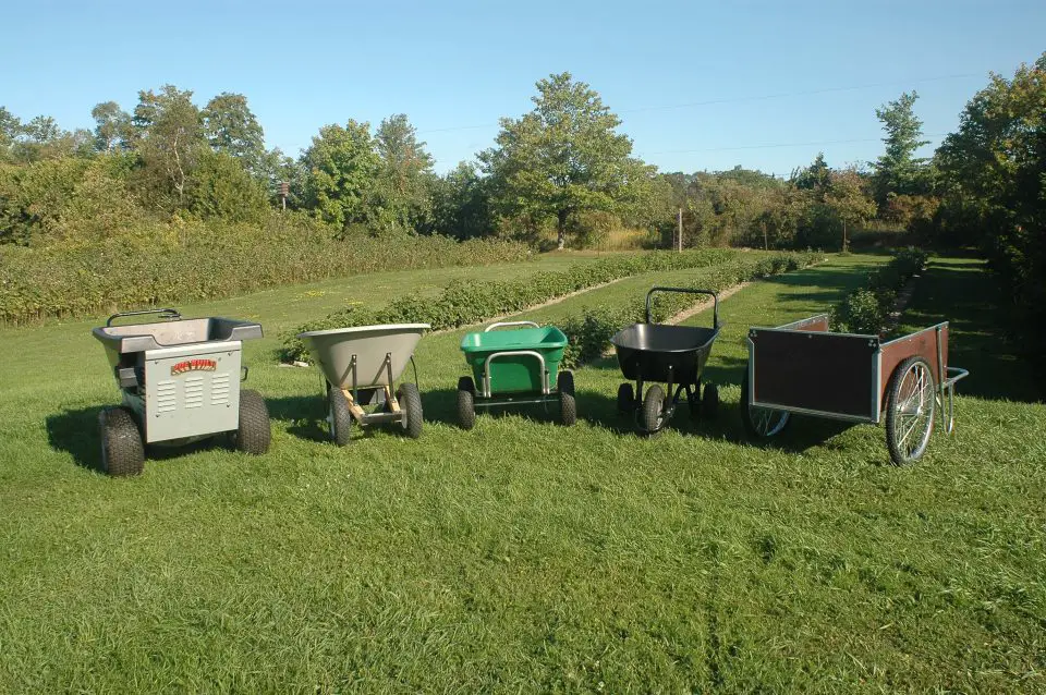 This is one group of wheelbarrows I’ve tested. The unit on the left is actually a gas-powered wheelbarrow capable of handling hundreds of pounds without making you sweat.