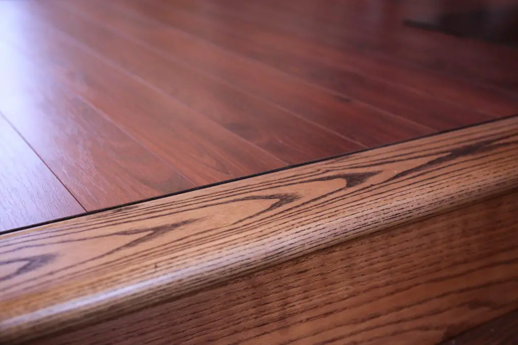 Close-up of oak hardwood floor step