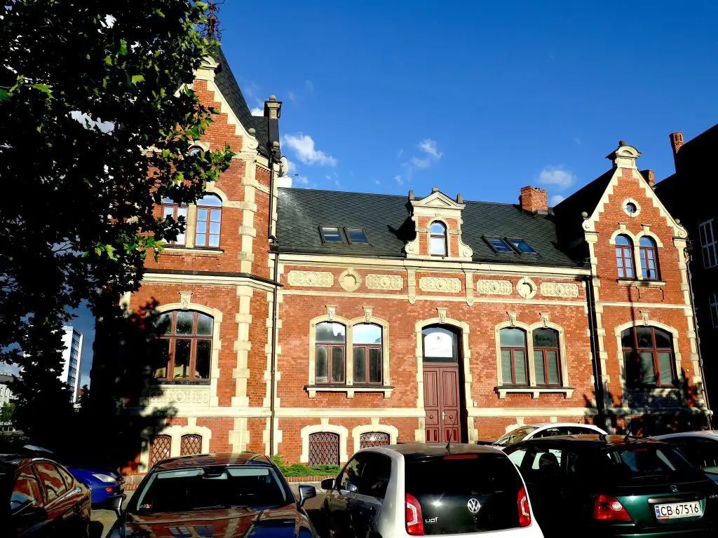Historic brick building under blue sky