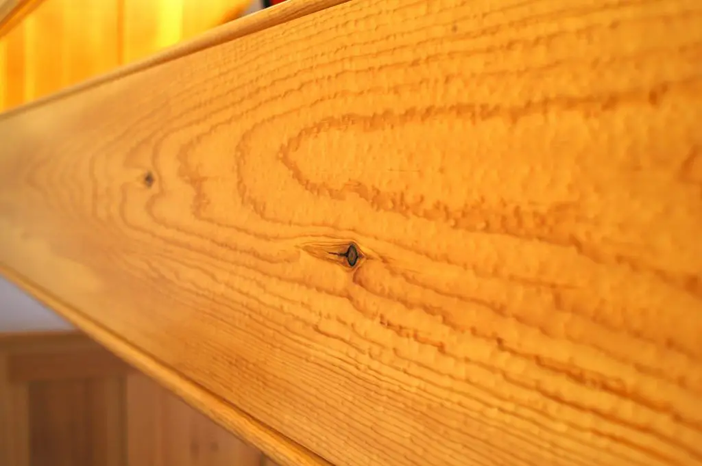 Close-up of wooden beam with knot details