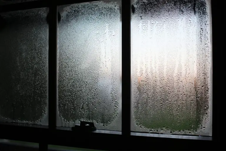Foggy window with morning light passing through.