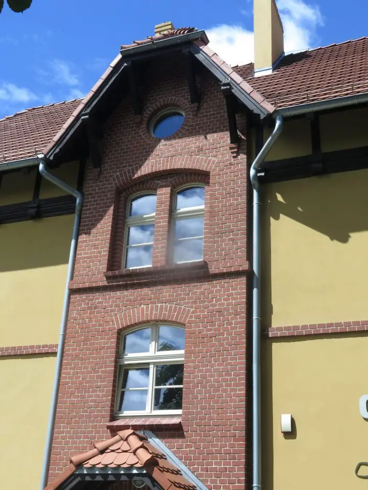 This classic use of brick is found in Bydgoszgz (pronounced “bid-gosh”), Poland. Notice how the windows are recessed, with the middle pair of windows separated by a brick pillar.