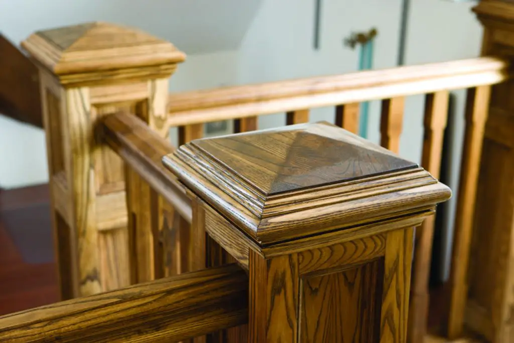 Wooden staircase with decorative post detail