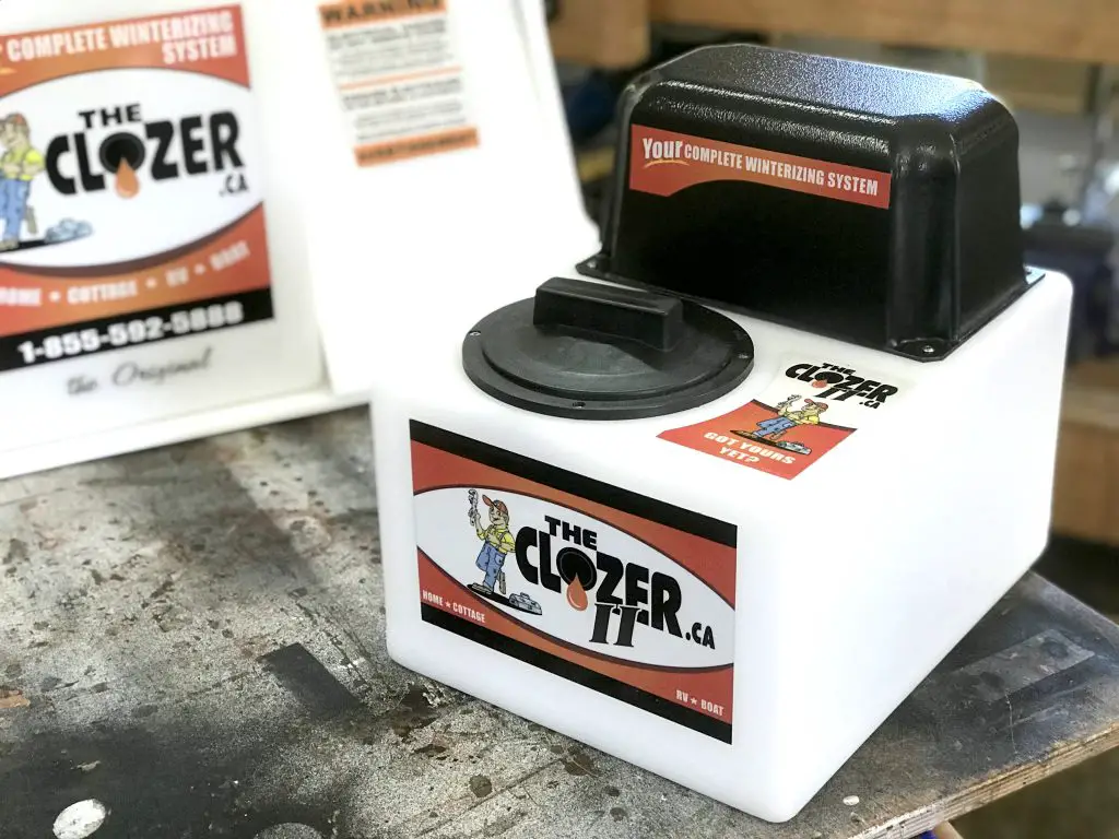 The Clozer winterizing system on a workbench.