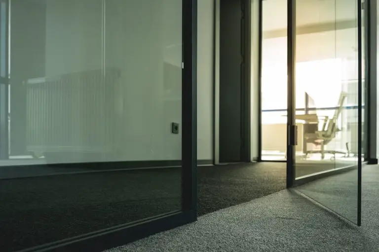 Sunny office with open glass door