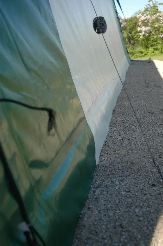 portable garage side flap buried