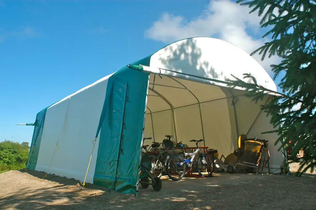 Bike storage in outdoor canopy tent.
