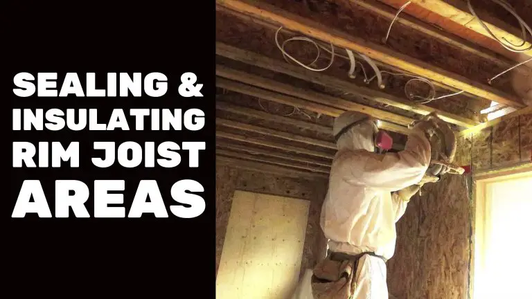 Worker sealing and insulating rim joist areas