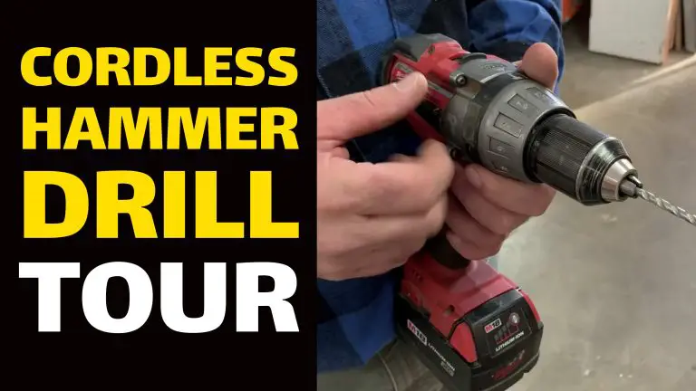Person holding cordless hammer drill.