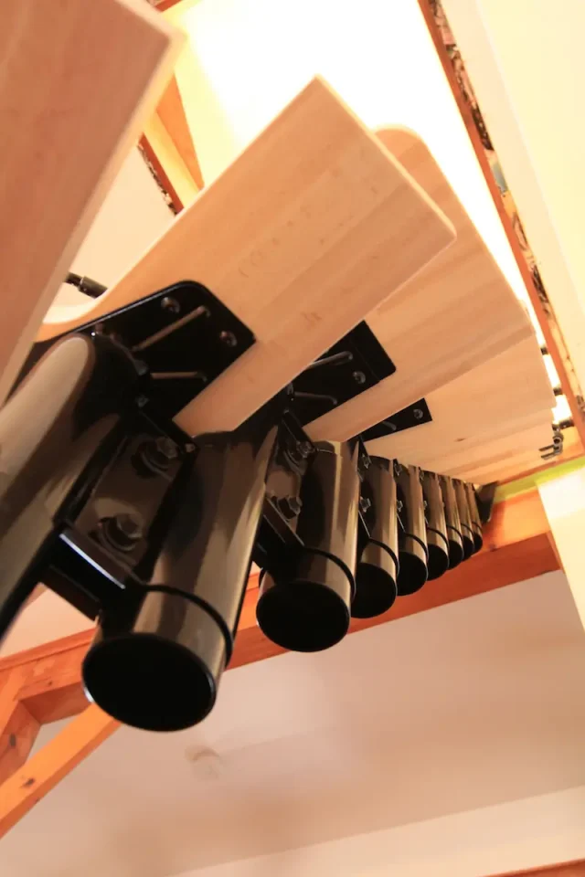 The underside of the Arke Karina staircase shows the interlocking metal framework that holds the wooden treads and allows the staircase to be curved as desired