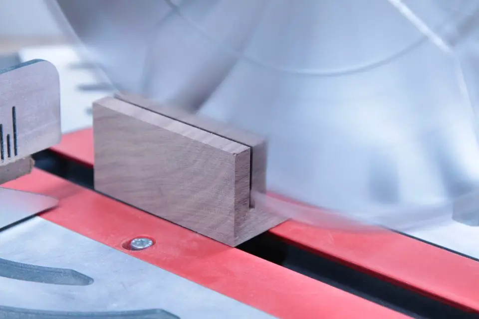 My chopsaw and I cutting a slice of walnut from a nice board. Realize that even the crosscuts you make are creative actions. Exactly where you crosscut can have a big impact on the final projects you build.