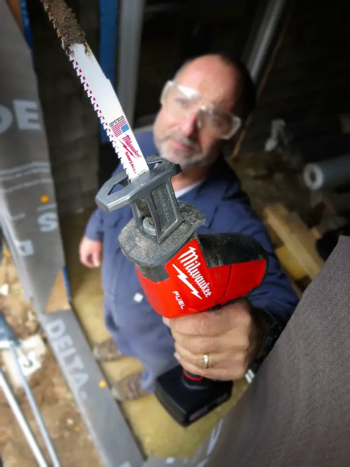Sometimes a compact recip saw is what you need. Here I am on one particular job that could not have been completed with any other kind of power tool.
