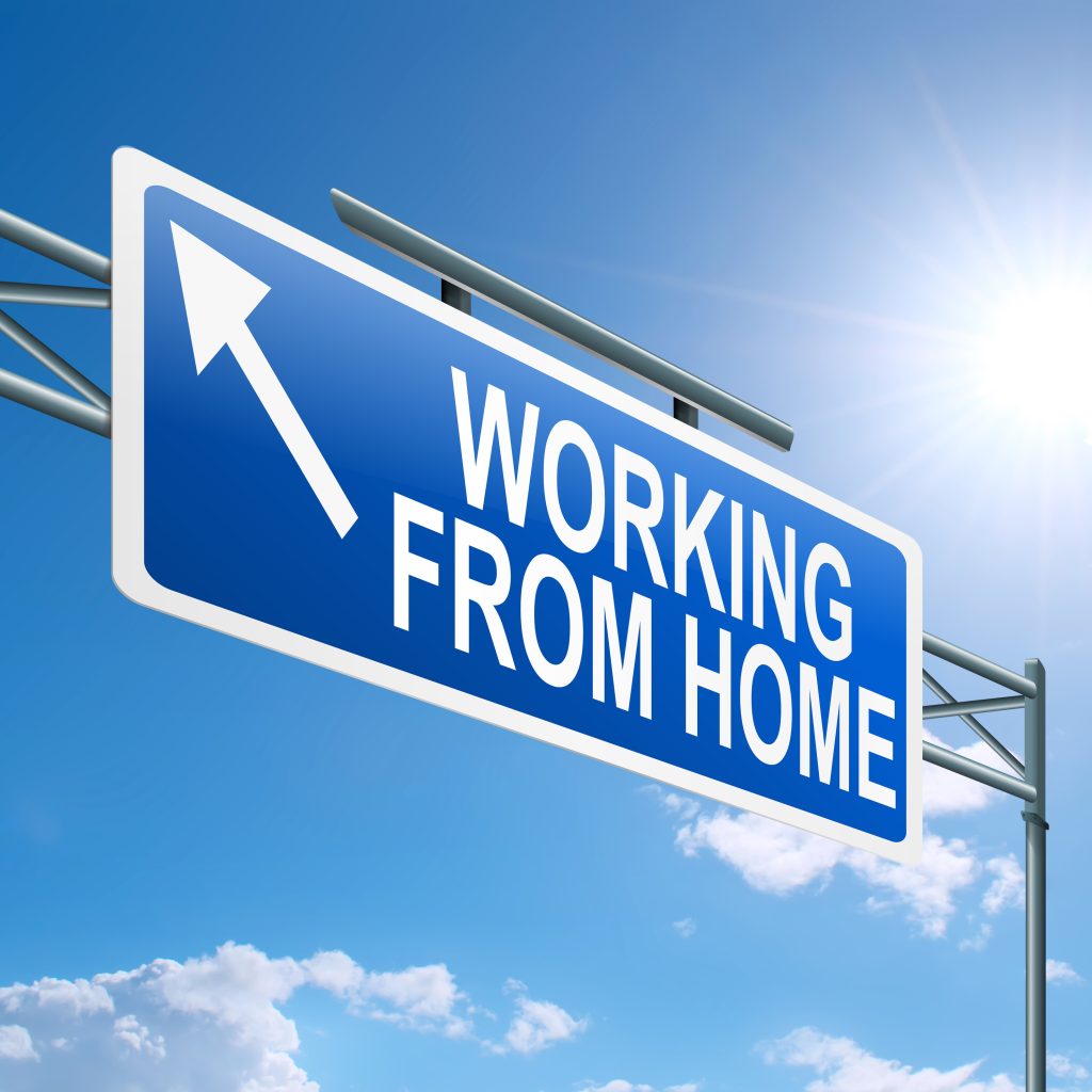 Sign reading 'Working from Home' under blue sky.