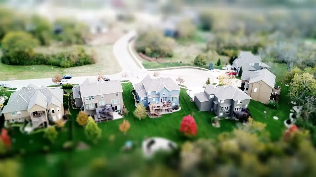 Suburban neighbourhood with homes and greenery.