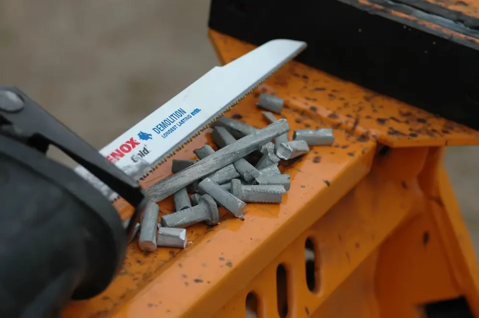 Today’s best recip saw blades can easily cut through multiple pieces of metal. Here a Lenox demolition blade as just made multiple cuts through a 12″ galvanized steel spike