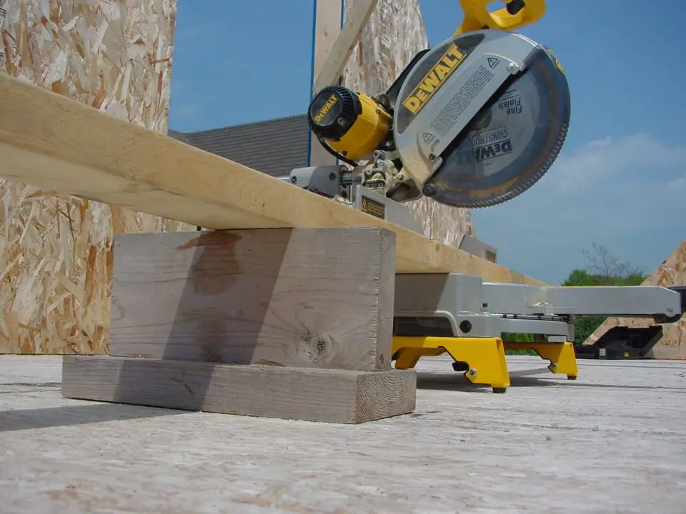 Site-built supports let you cut long wood accurately by supporting long pieces of lumber at the same height as the support table of the chopsaw.