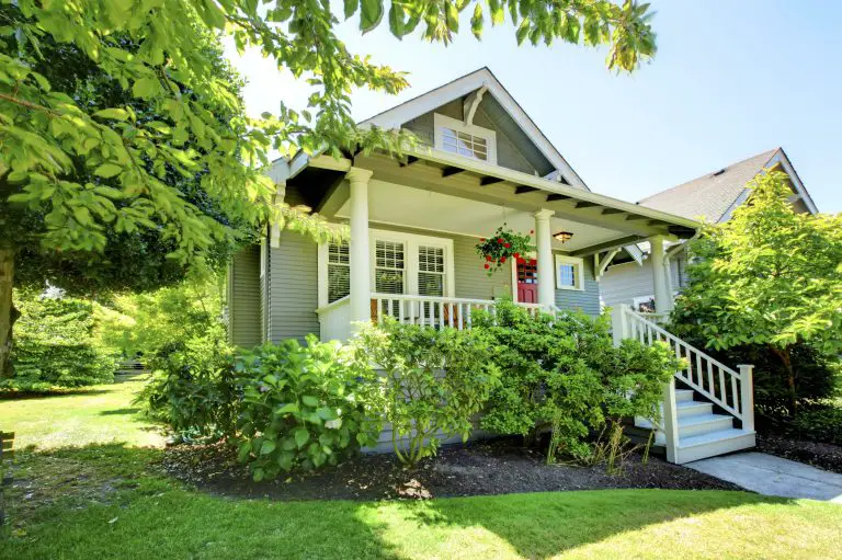 Charming house with porch and green garden