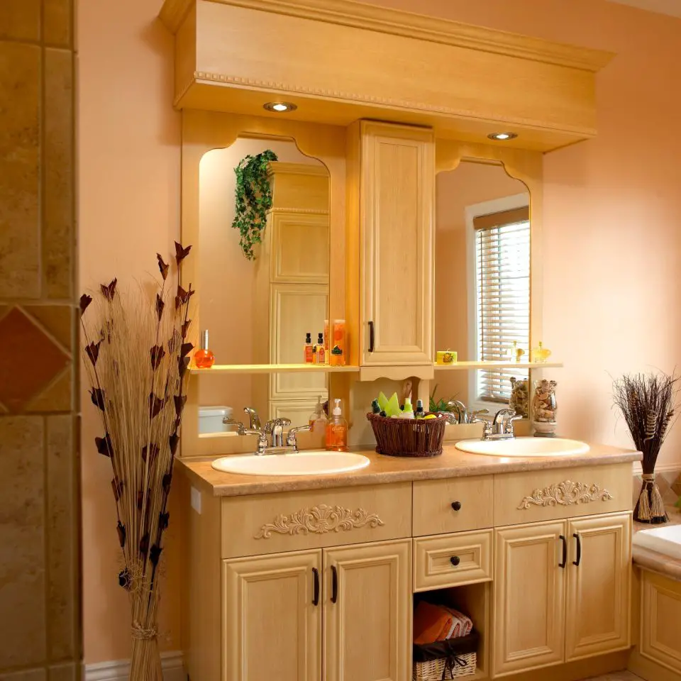 This bathroom cabinet and surrounding trim are all made with wrapped profiles. They save high-end forest resources and quite a bit of cash, too.
