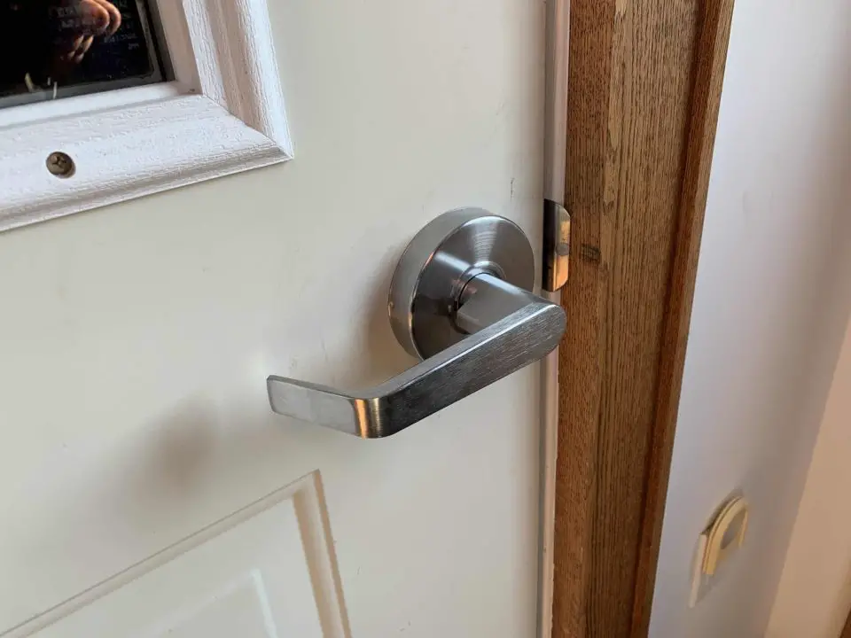 Lever-style door handles like this one make it much easier to open doors when declining grip strength is an issue.