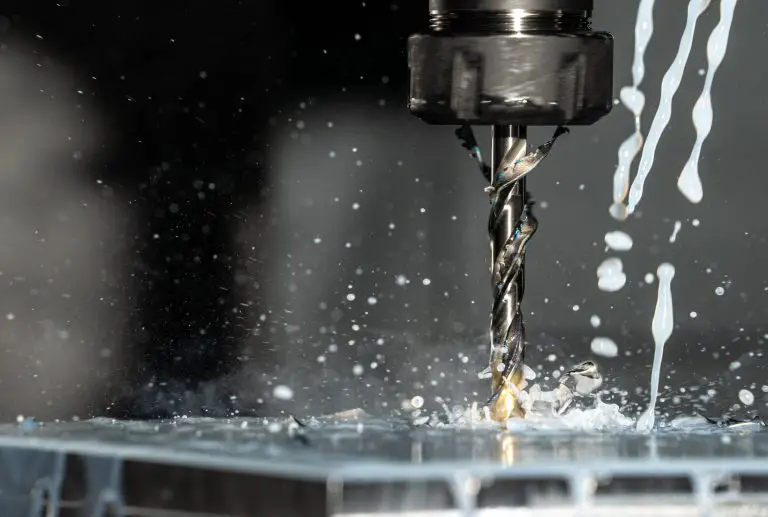 Close-up of drill with cooling lubricant