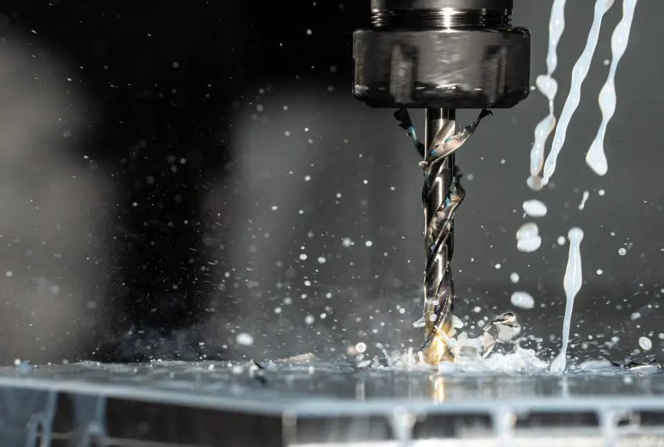 Close-up of drill with cooling lubricant