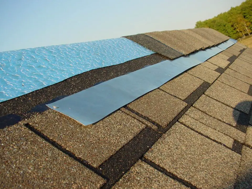 This zinc strip placed below top cap shingles prevents growth of lichen and most up to 20 feet downstream from the metal.