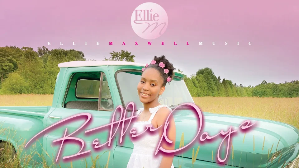 Smiling girl by pastel green truck, countryside background.