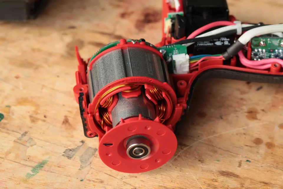 Close-up view of a red electric motor.