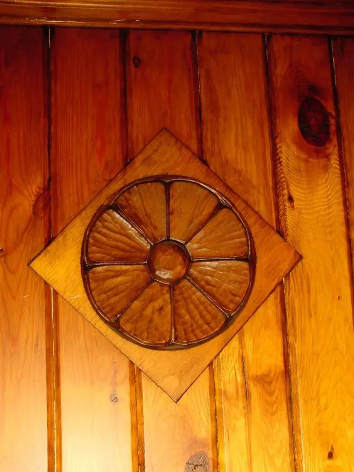 Wooden wall art with circular floral design