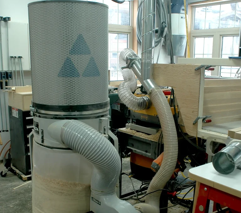 Industrial dust collector in a woodworking shop