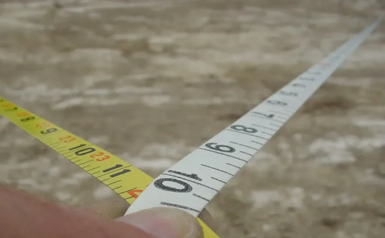 Close-up of measuring tape on ground