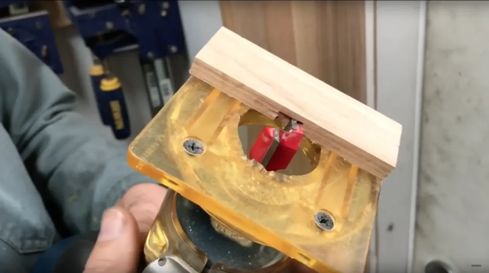 Woodworking tool sanding wooden piece.