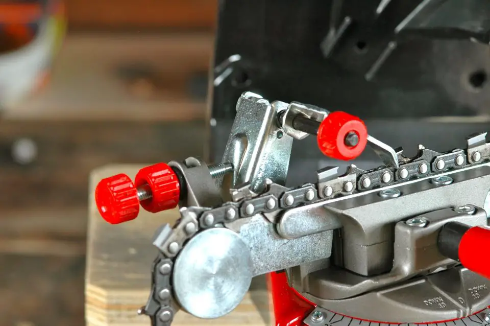 This part of the sharpener locates each saw chain tool in the same position while grinding. This is essential for the consistency needed in a well-sharpened chain.