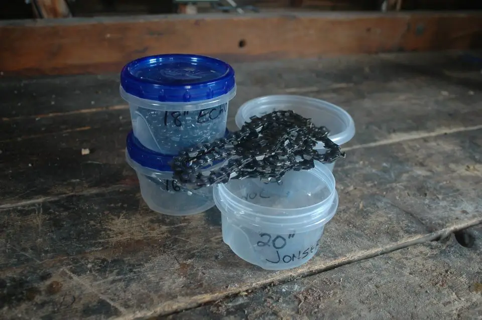 Small containers like these are good for storing pre-sharpened chains. Take a sharp chain or two with you in the bush and you can swap it for a dull chain and get cutting again faster.