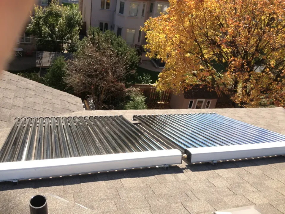 These evacuated tube solar collectors gather energy from the sun to heat water that’s stored in an insulated tank in the basement. This energy is used for space heating and domestic hot water.