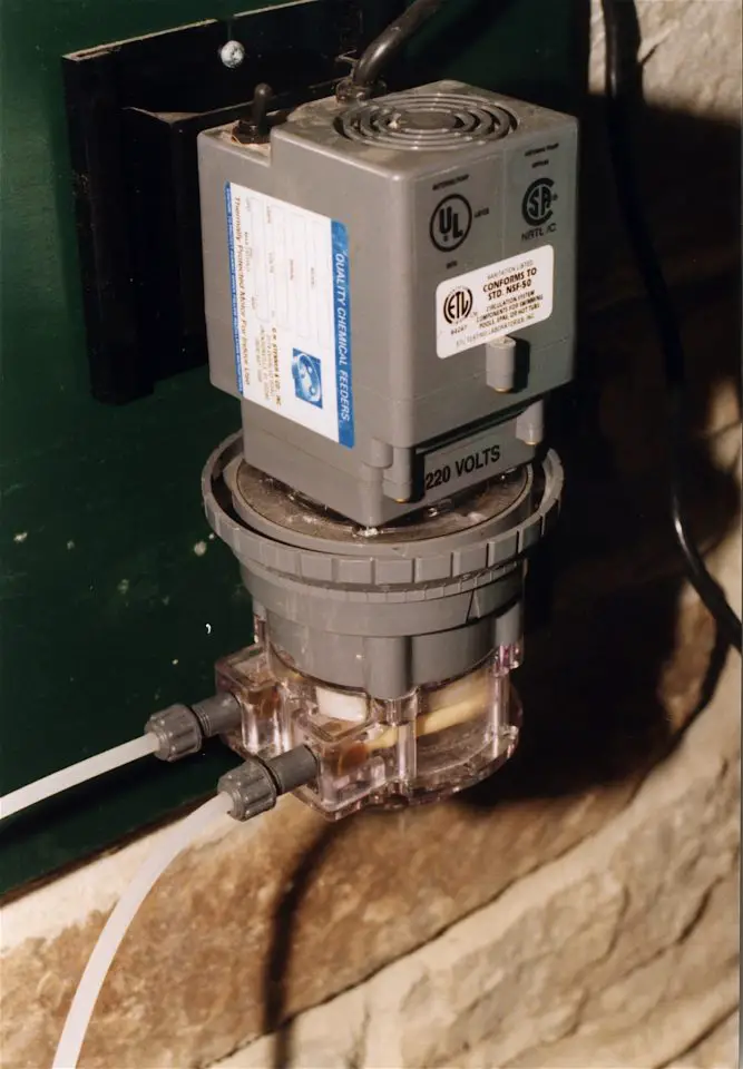 This is the injection pump at our place that delivers 35% hydrogen peroxide into the incoming well water stream at a rate of about 25 parts per million (ppm). The injection pump is energized every time the well pump comes on.