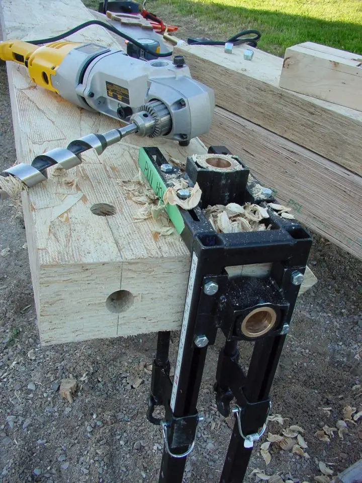 The Timberlinx system depends on precise hole locations created with this drilling jig. The self-feeding bit pulls itself through the wood, creating the holes with minimal effort. This is an engineered beam that I joined with another to make the ridge beam of the workshop I built.