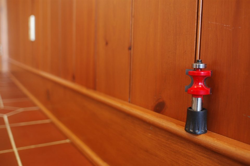 This is one application for a bullnose router bit. The vertical boards started out as ordinary 1×6 pine, but became beautiful wainscoting after a small bullnose was routed along one edge of each board. The top of the baseboard here is capped with a thicker piece of bullnose.