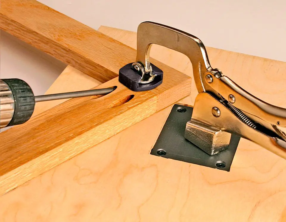 The specialized Vise-Grip pliers hold this wood joint in alignment while pocket screws are driven home.