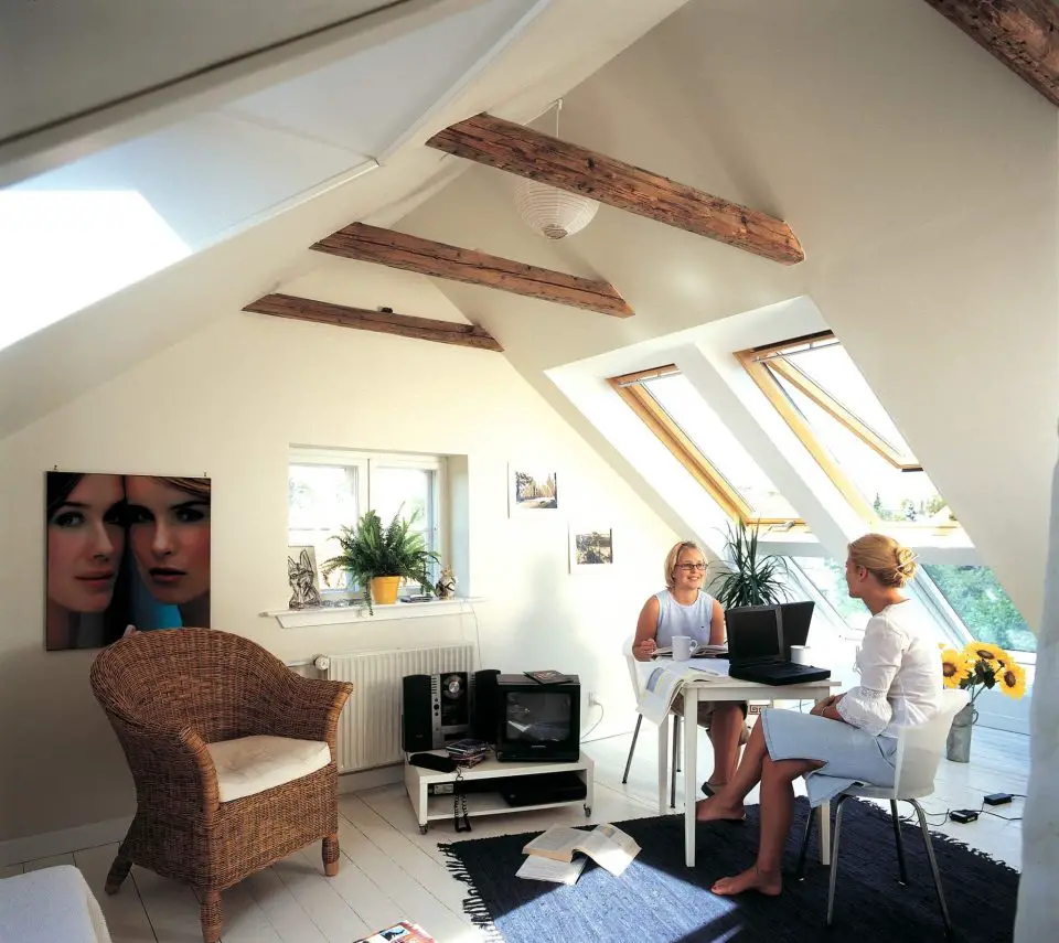 Openable skylights are essential for making this attic light, airy and beautiful.