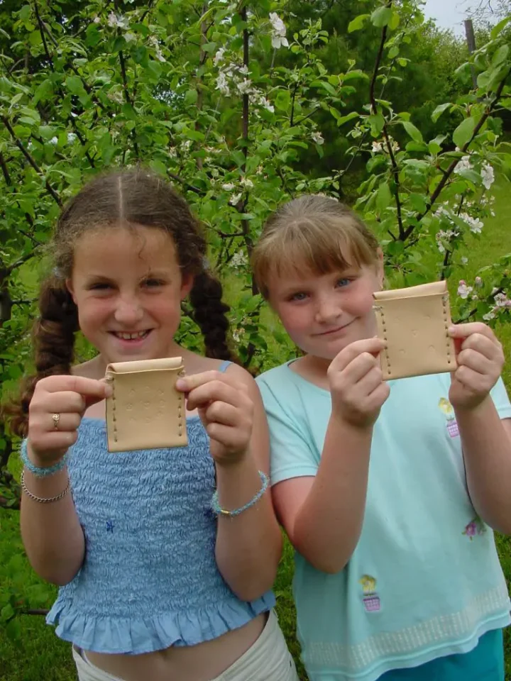 These leather pouches were part of my oldest daughter’s (Katherine, left) 9th birthday party. We set up different activity stations, all involving tools and making things. Click here to see what Katherine has done with her introduction to the hands-on life.