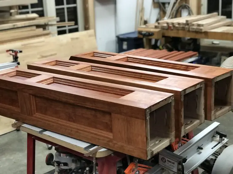 Wooden cabinet doors on workshop table