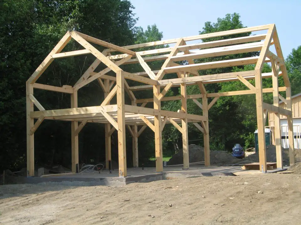 One of Ray Gibbs’ timber frames, erected and ready to close in.